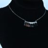 Silver Toned Curved Bar Pendant with Dangling Charms (PD0012)